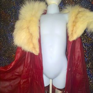 RED BURGUNDY FUR PUNCHO WITH BUTTONS SLIGHT TEAR INSIDE ON LEFT
